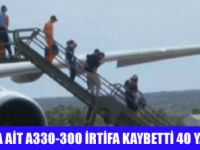 YOLCU UÇAĞI İRTİFA KAYBETTİ 40 YARALI